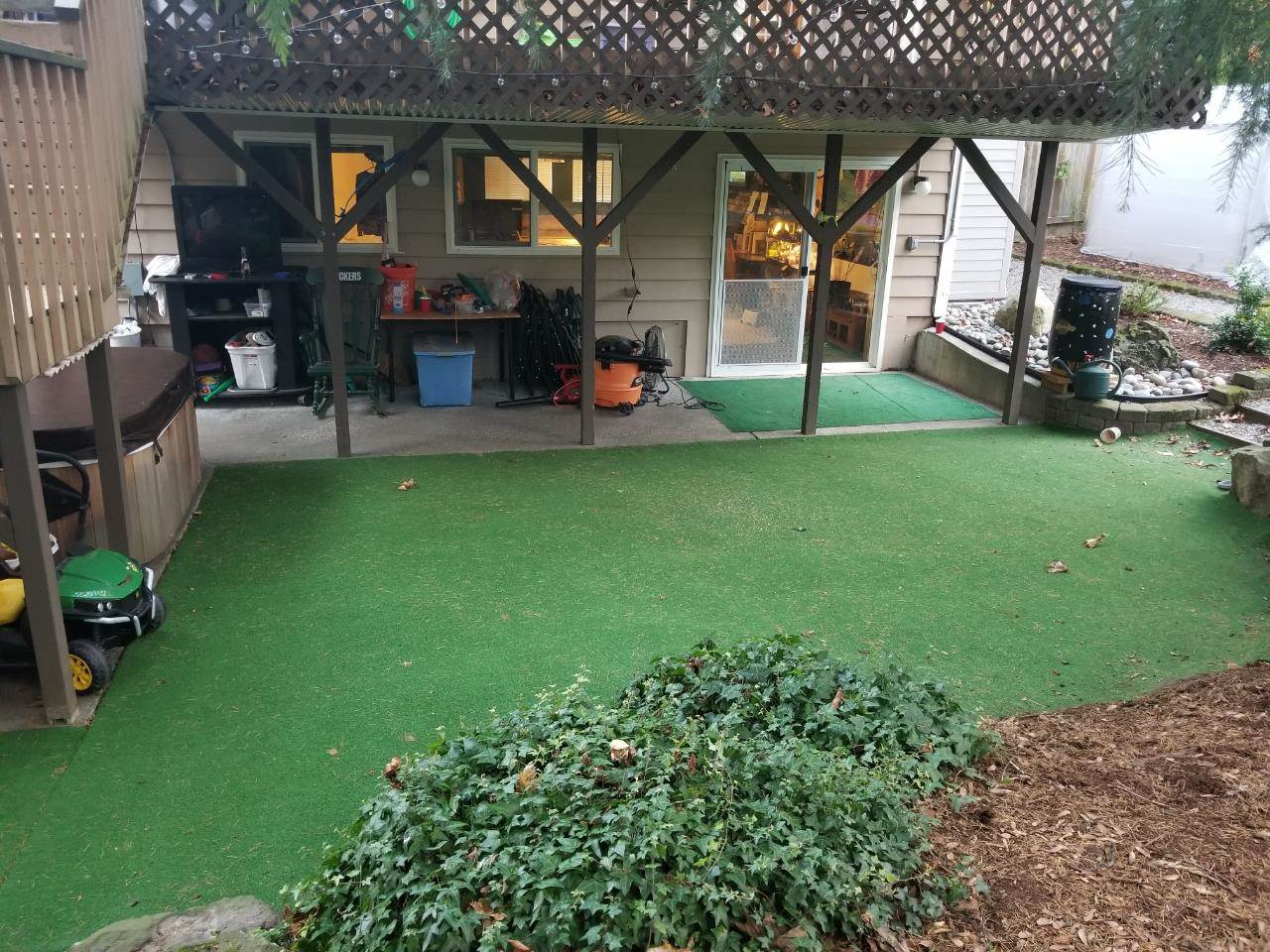 Customer review image of  in back yard under my deck and pine trees
